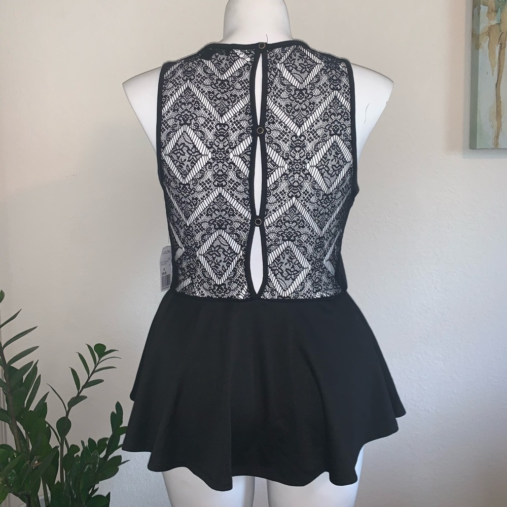 Sleeveless Black Peplum Top